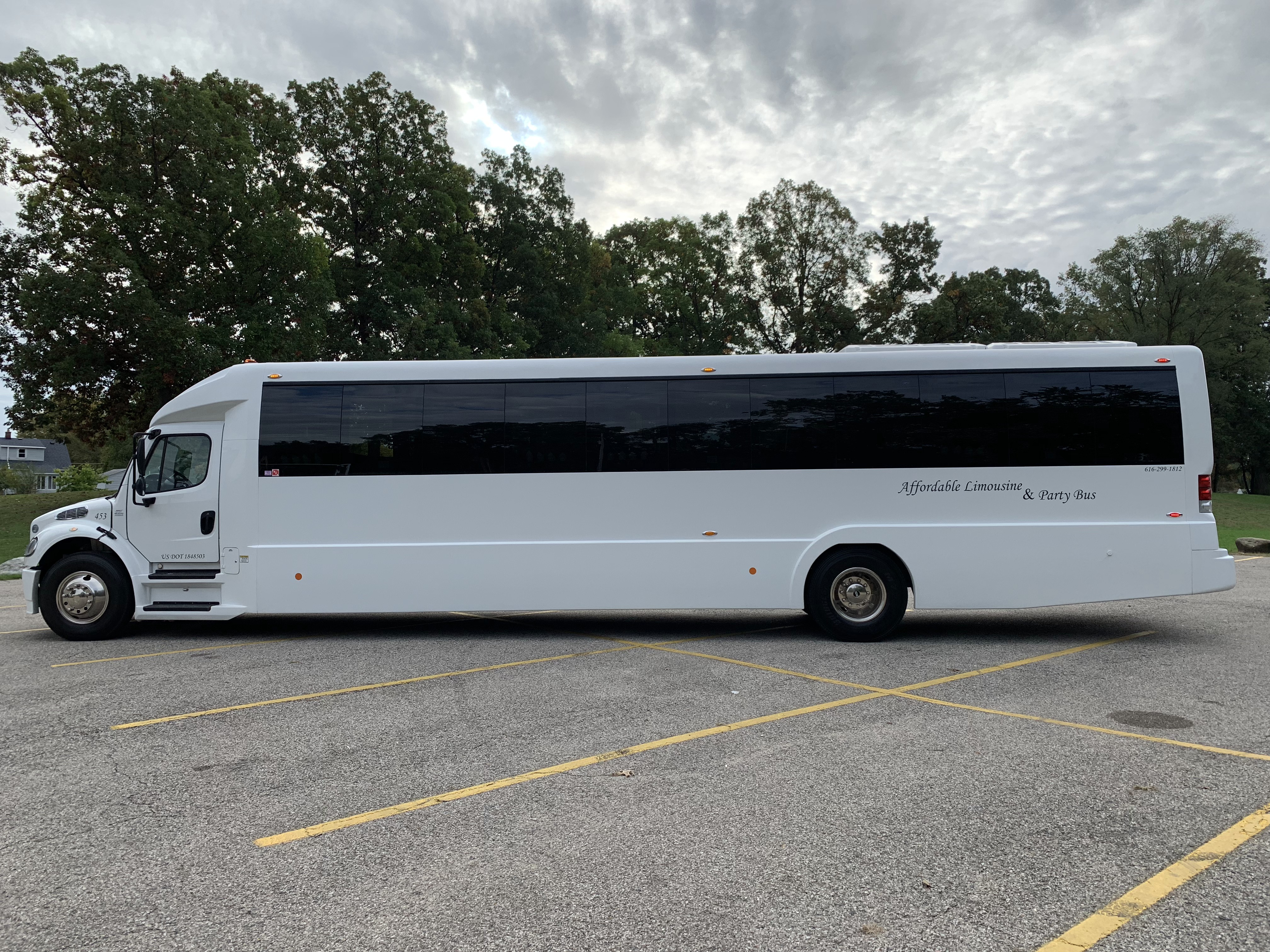 45 Passenger Luxury Limo Coach Driver's Side