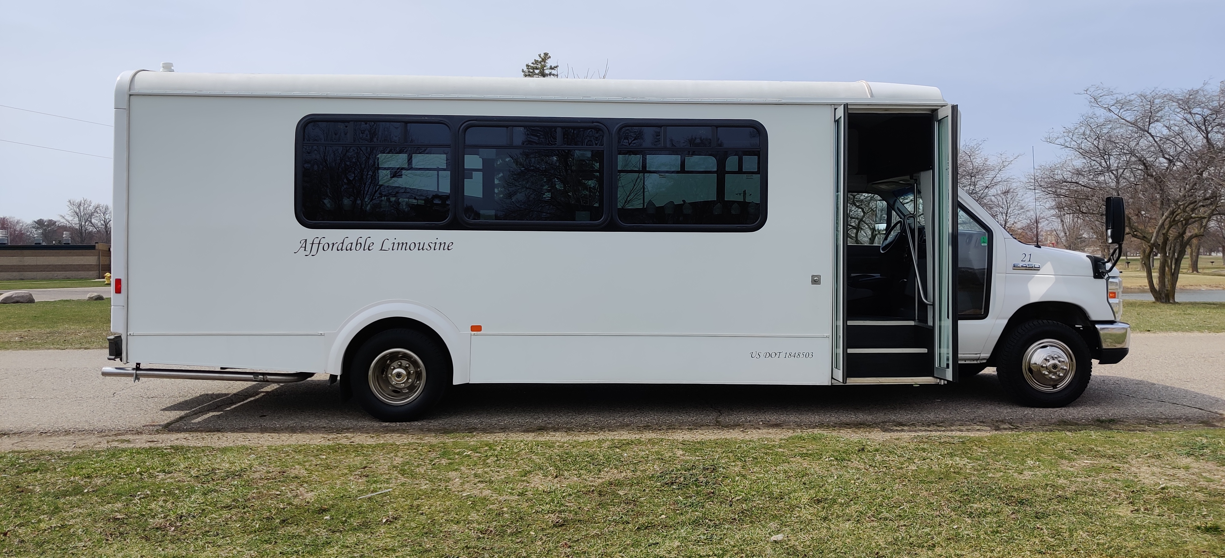 21 Passenger Luxury Limo Bus Passenger's Side