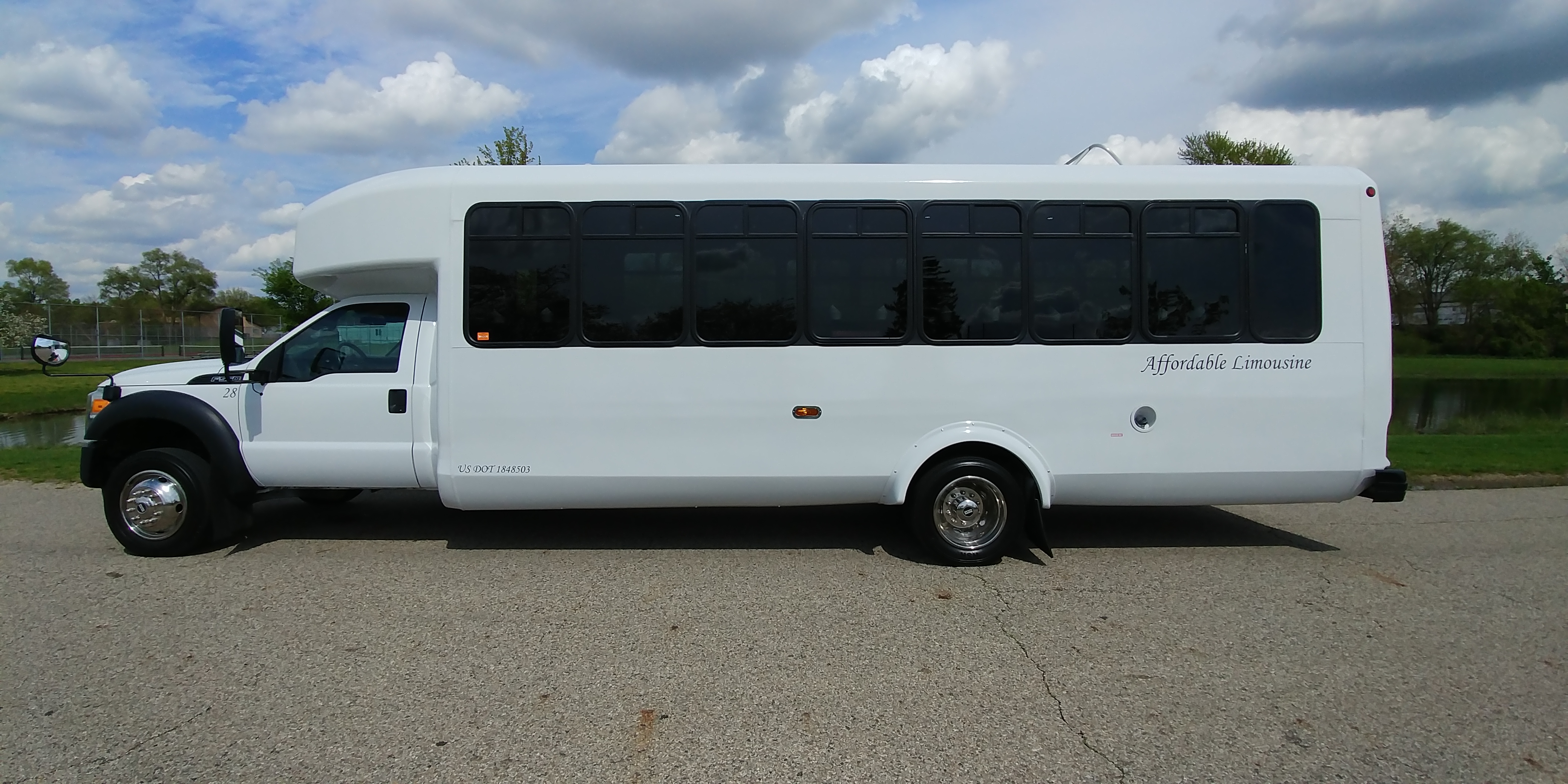 28 Passenger Luxury Limo Bus Driver's Side