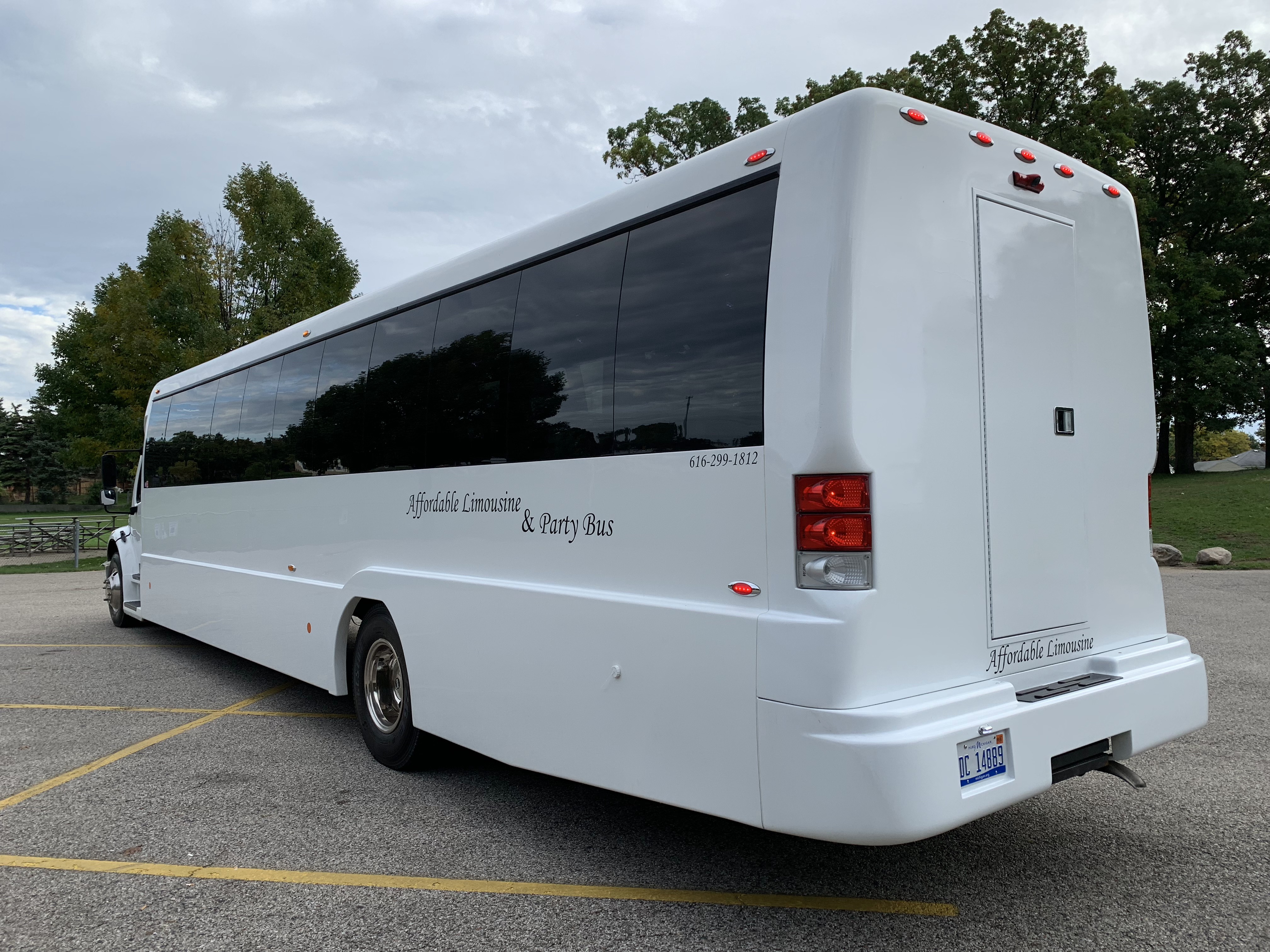 45 Passenger Luxury Limo Coach Driver's Side Rear